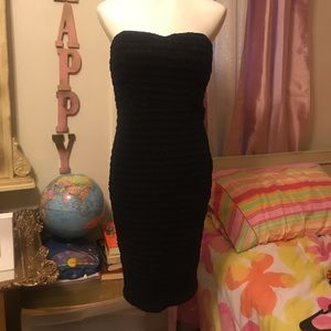 BLack strapless dress.